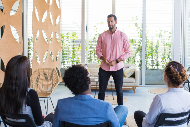 Professionals attending a knowledge session around a table