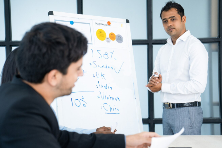 Entrepreneur receiving mentorship during a business discussion